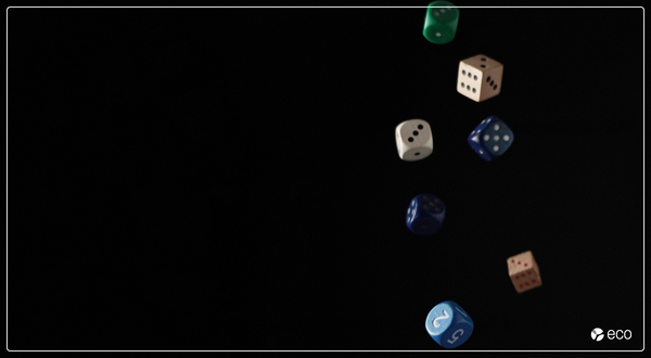 Dice falling over black background